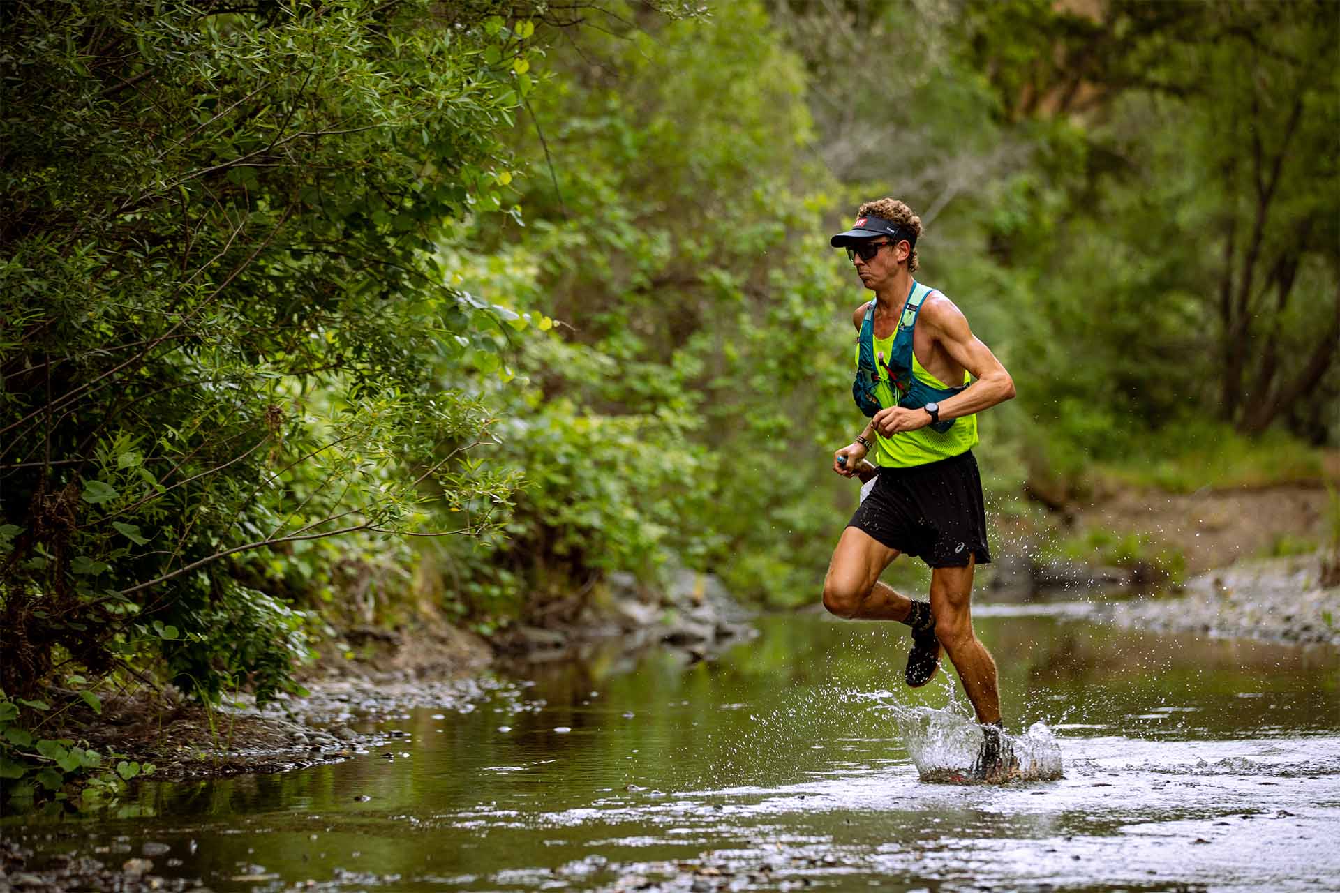 Runner going through creek at Lake Sonoma
